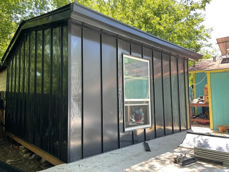 Black standing seam metal wall panels for Metal Roof Installation in North Little Rock