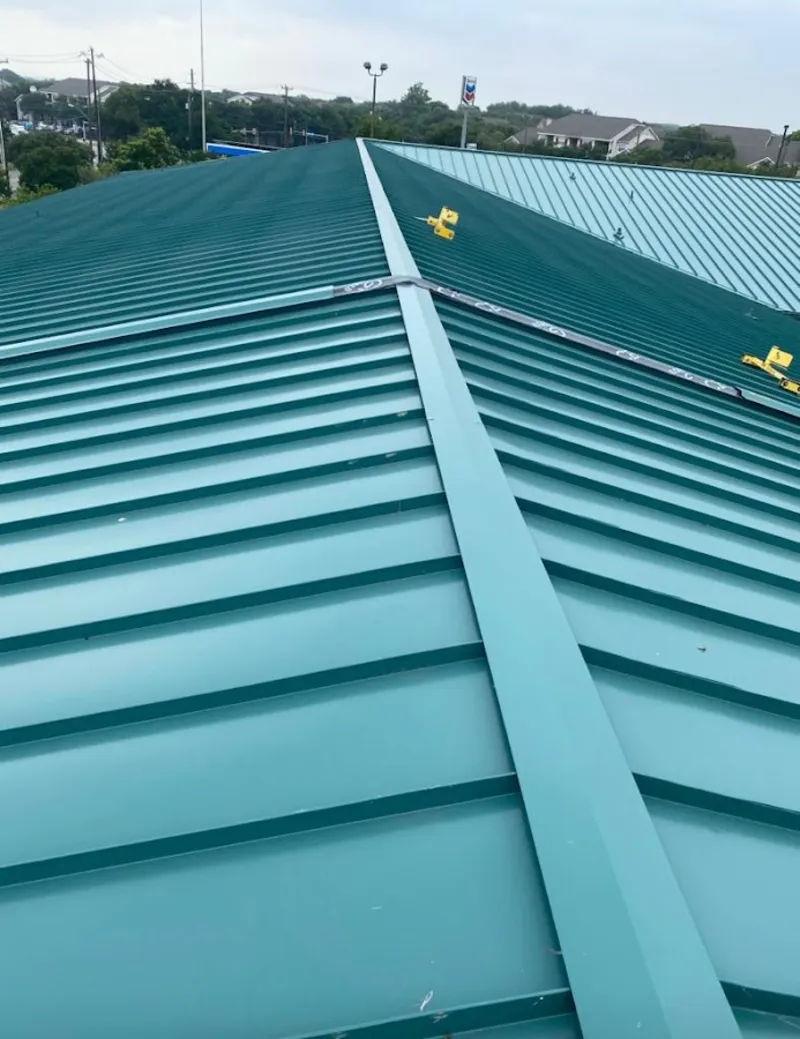 Green commercial metal roof ridge and valley for Metal Roof Repair in North Little Rock